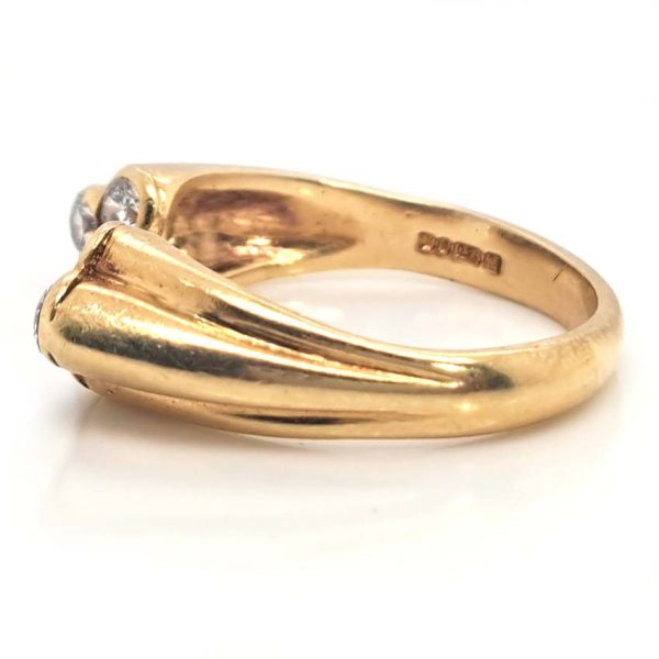 Vintage Kutchinsky Diamond Ring, tapered fluted 18ct yellow gold band to two sets of three sparkling diamonds to the front. Signed Kutchinsky, Circa 1975. Comes in a vintage Kutchinsky box