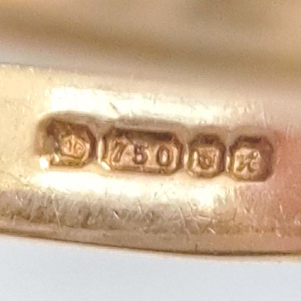 Vintage Kutchinsky Diamond Ring, tapered fluted 18ct yellow gold band to two sets of three sparkling diamonds to the front. Signed Kutchinsky, Circa 1975. Comes in a vintage Kutchinsky box