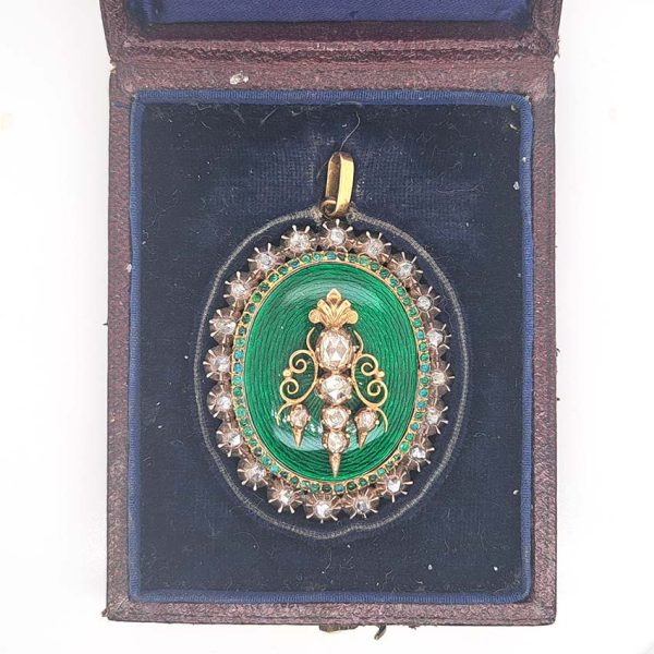 Victorian Antique Green Enamel and Diamond Locket Pendant, green enamel with rose-cut diamond surround and central design set in silver to 18ct yellow gold with floral detailed reverse panel which opens to reveal locket compartment. Comes in original antique fitted box
