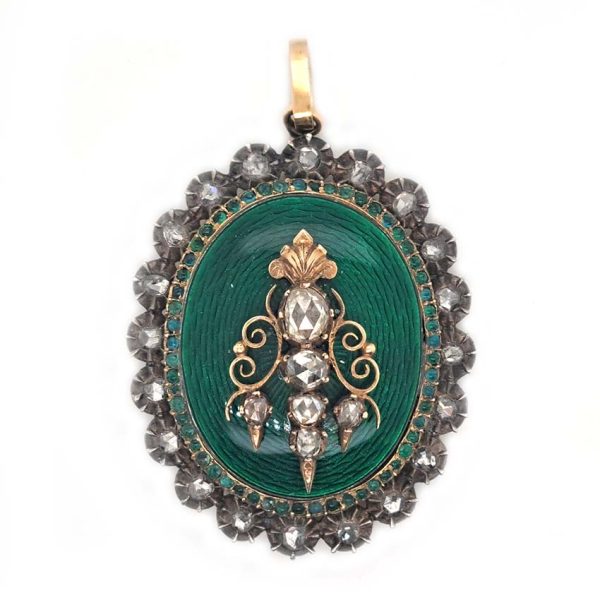 Victorian Antique Green Enamel and Diamond Locket Pendant, green enamel with rose-cut diamond surround and central design set in silver to 18ct yellow gold with floral detailed reverse panel which opens to reveal locket compartment. Comes in original antique fitted box