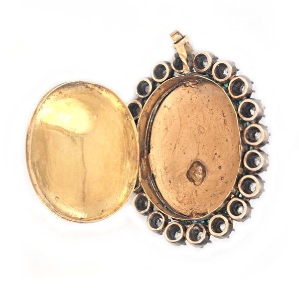 Victorian Antique Green Enamel and Diamond Locket Pendant, green enamel with rose-cut diamond surround and central design set in silver to 18ct yellow gold with floral detailed reverse panel which opens to reveal locket compartment. Comes in original antique fitted box