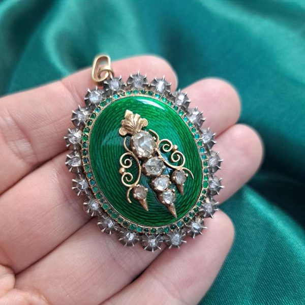 Victorian Antique Green Enamel and Diamond Locket Pendant, green enamel with rose-cut diamond surround and central design set in silver to 18ct yellow gold with floral detailed reverse panel which opens to reveal locket compartment. Comes in original antique fitted box