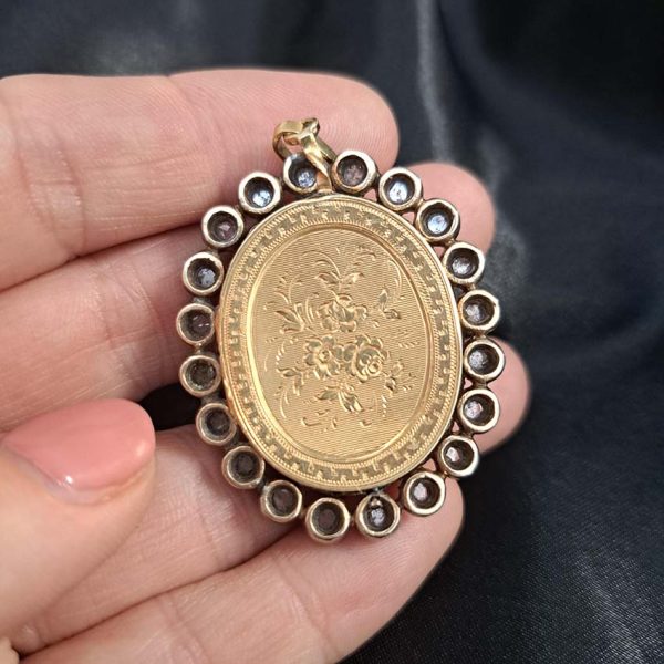 Victorian Antique Green Enamel and Diamond Locket Pendant, green enamel with rose-cut diamond surround and central design set in silver to 18ct yellow gold with floral detailed reverse panel which opens to reveal locket compartment. Comes in original antique fitted box