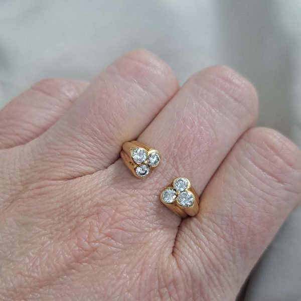 Vintage Kutchinsky Diamond Ring, tapered fluted 18ct yellow gold band to two sets of three sparkling diamonds to the front. Signed Kutchinsky, Circa 1975. Comes in a vintage Kutchinsky box