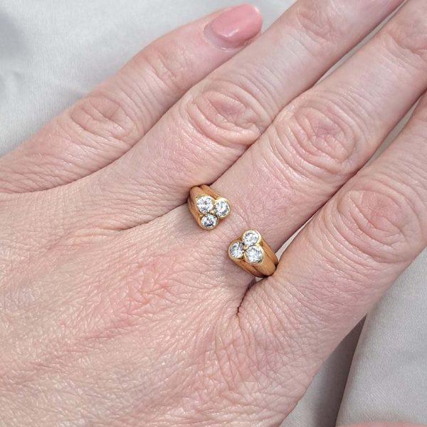 Vintage Kutchinsky Diamond Ring, tapered fluted 18ct yellow gold band to two sets of three sparkling diamonds to the front. Signed Kutchinsky, Circa 1975. Comes in a vintage Kutchinsky box