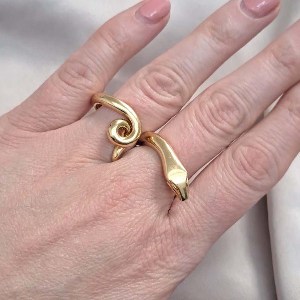 Boucheron Gold Double Finger Snake Ring, 18ct yellow gold snake worn over two fingers. Signed and numbered B25539