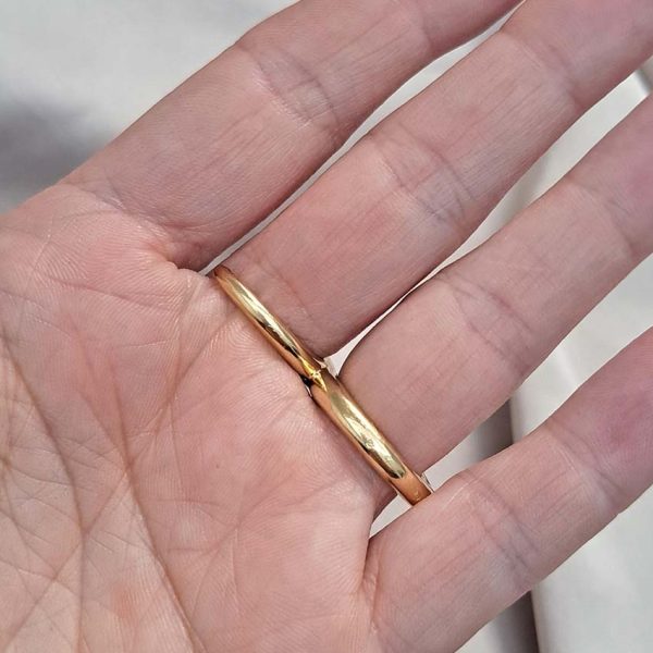 Boucheron Gold Double Finger Snake Ring, 18ct yellow gold snake worn over two fingers. Signed and numbered B25539
