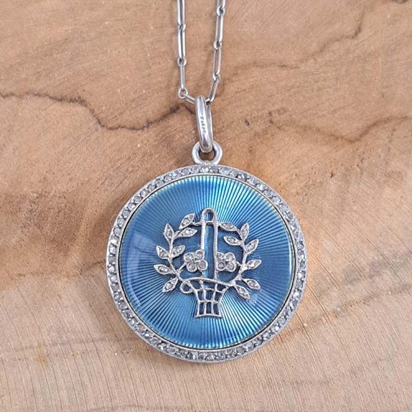 Antique Blue Enamel and Diamond Locket Pendant, cornflower blue enamel with central diamond floral pattern within diamond border. Hidden locket compartment to reverse