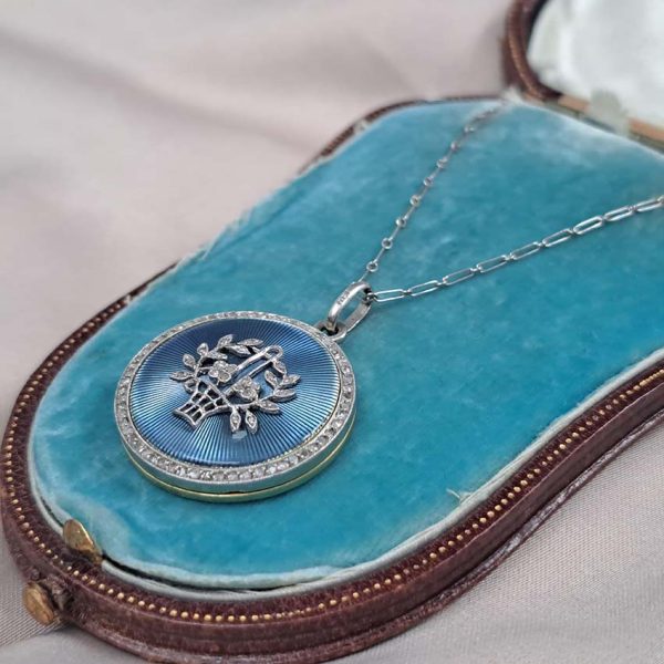 Antique Blue Enamel and Diamond Locket Pendant, cornflower blue enamel with central diamond floral pattern within diamond border. Hidden locket compartment to reverse