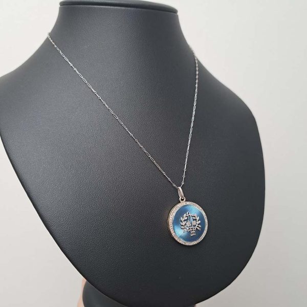 Antique Blue Enamel and Diamond Locket Pendant, cornflower blue enamel with central diamond floral pattern within diamond border. Hidden locket compartment to reverse
