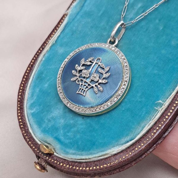 Antique Blue Enamel and Diamond Locket Pendant, cornflower blue enamel with central diamond floral pattern within diamond border. Hidden locket compartment to reverse