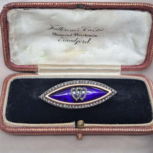 Victorian Antique Blue Enamel and Diamond Navette Brooch, navette-shaped brooch decorated with blue enamel with two diamond entwinned hearts within diamond border