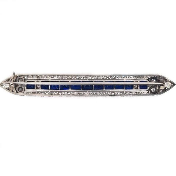 Art Deco 5.5ct Sapphire and Diamond Bar Brooch in Platinum, line of baguette rectangular square shaped step-cut sapphires within 3.50ct old European transitional cut diamonds