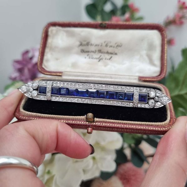 Art Deco 5.5ct Sapphire and Diamond Bar Brooch in Platinum, line of baguette rectangular square shaped step-cut sapphires within 3.50ct old European transitional cut diamonds