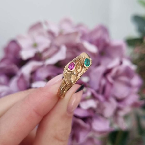 Vintage Gem Set 18ct Yellow Gold Double Snake Ring, two entwinned snakes with emerald and ruby to the head and rose-cut diamond set eyes