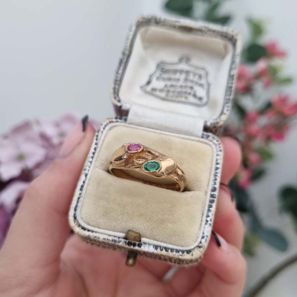 Vintage Gem Set 18ct Yellow Gold Double Snake Ring, two entwinned snakes with emerald and ruby to the head and rose-cut diamond set eyes