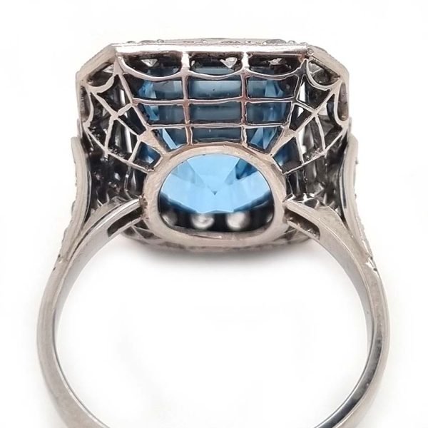 Vintage Santa Maria Aquamarine and Diamond Cluster Dress Ring, intense blue emerald-cut aquamarine millegrain set within 1ct old-cut diamond border in platinum