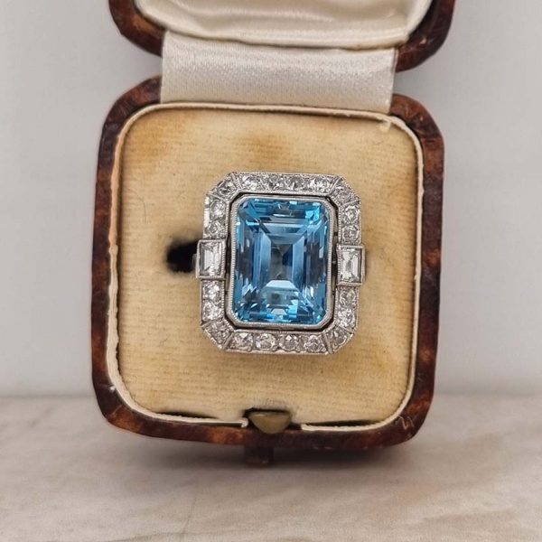 Vintage Santa Maria Aquamarine and Diamond Cluster Dress Ring, intense blue emerald-cut aquamarine millegrain set within 1ct old-cut diamond border in platinum