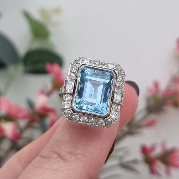 Vintage Santa Maria Aquamarine and Diamond Cluster Dress Ring, intense blue emerald-cut aquamarine millegrain set within 1ct old-cut diamond border in platinum