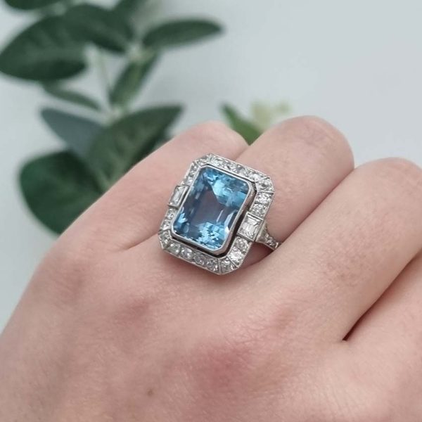 Vintage Santa Maria Aquamarine and Diamond Cluster Dress Ring, intense blue emerald-cut aquamarine millegrain set within 1ct old-cut diamond border in platinum