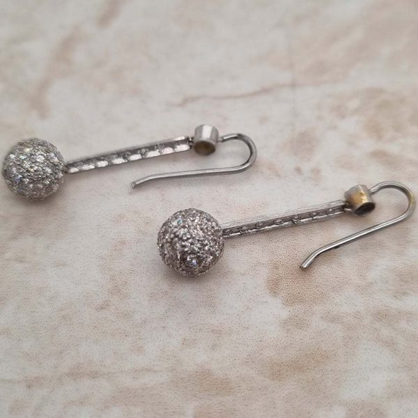 Vintage 1ct Diamond Ball Sphere Cluster Drop Earrings, diamond encrusted spheres suspended from diamond drops in platinum with shepherd hook fittings. Circa 1930