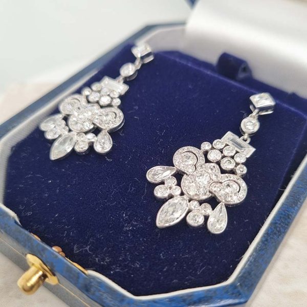 Belle Epoque Antique 2.30ct Diamond Chandelier Drop Earrings, French cut diamond tops suspend graduating fans of baguette, old cut round, marquise and pear cut diamonds, with central stylised leaf giardiniera design in platinum