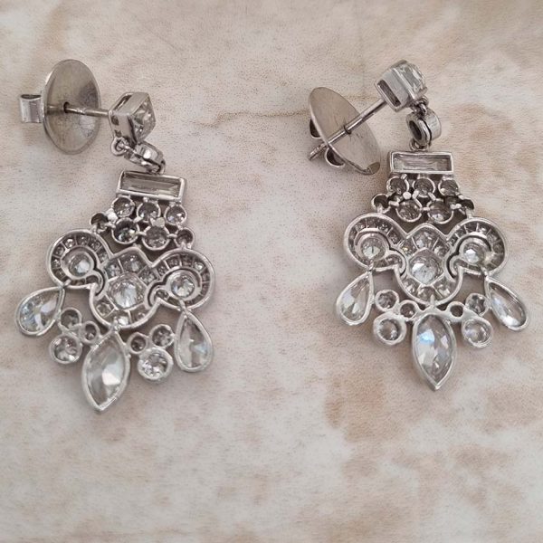 Belle Epoque Antique 2.30ct Diamond Chandelier Drop Earrings, French cut diamond tops suspend graduating fans of baguette, old cut round, marquise and pear cut diamonds, with central stylised leaf giardiniera design in platinum