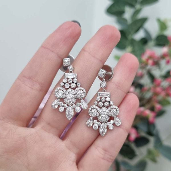 Belle Epoque Antique 2.30ct Diamond Chandelier Drop Earrings, French cut diamond tops suspend graduating fans of baguette, old cut round, marquise and pear cut diamonds, with central stylised leaf giardiniera design in platinum