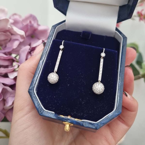 Vintage 1ct Diamond Ball Sphere Cluster Drop Earrings, diamond encrusted spheres suspended from diamond drops in platinum with shepherd hook fittings. Circa 1930