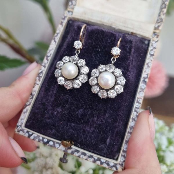 Antique Natural Pearl and 6ct Old Cut Diamond Cluster Drop Earrings, natural button saltwater pearls surrounded by 6cts old mine-cut diamonds in silver to 18ct yellow gold. Late 19th century Circa 1880
