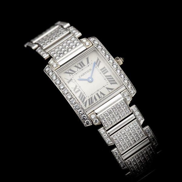 Cartier Tank Francaise 2365 White Gold Factory Diamonds Watch with Cartier service 2024, fully loaded set with approx. 6 carats of top colour and clarity round brilliant cut diamonds. Presented in its Cartier box along with a Cartier service warranty certificate from 2024 2 year warranty from Cartier