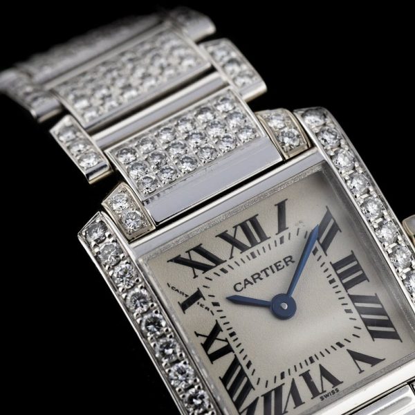 Cartier Tank Francaise 2365 White Gold Factory Diamonds Watch with Cartier service 2024, fully loaded set with approx. 6 carats of top colour and clarity round brilliant cut diamonds. Presented in its Cartier box along with a Cartier service warranty certificate from 2024 2 year warranty from Cartier