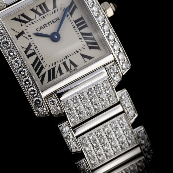 Cartier Tank Francaise 2365 White Gold Factory Diamonds Watch with Cartier service 2024, fully loaded set with approx. 6 carats of top colour and clarity round brilliant cut diamonds. Presented in its Cartier box along with a Cartier service warranty certificate from 2024 2 year warranty from Cartier