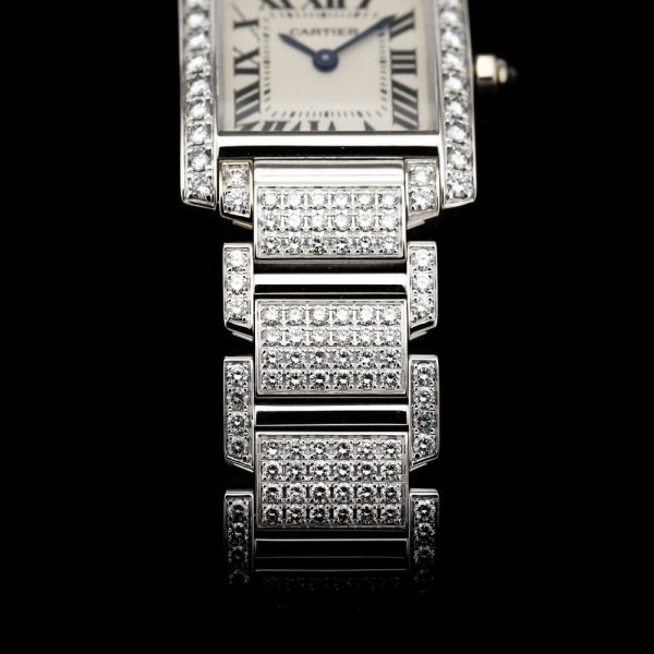 Cartier Tank Francaise 2365 White Gold Factory Diamonds Watch with Cartier service 2024, fully loaded set with approx. 6 carats of top colour and clarity round brilliant cut diamonds. Presented in its Cartier box along with a Cartier service warranty certificate from 2024 2 year warranty from Cartier