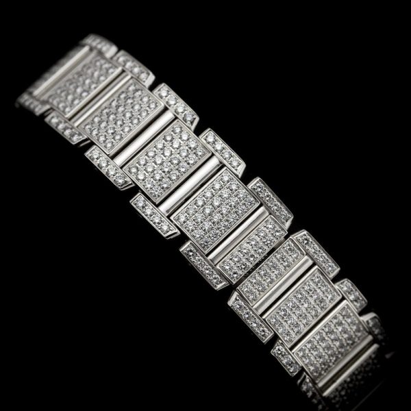 Cartier Tank Francaise 2365 White Gold Factory Diamonds Watch with Cartier service 2024, fully loaded set with approx. 6 carats of top colour and clarity round brilliant cut diamonds. Presented in its Cartier box along with a Cartier service warranty certificate from 2024 2 year warranty from Cartier