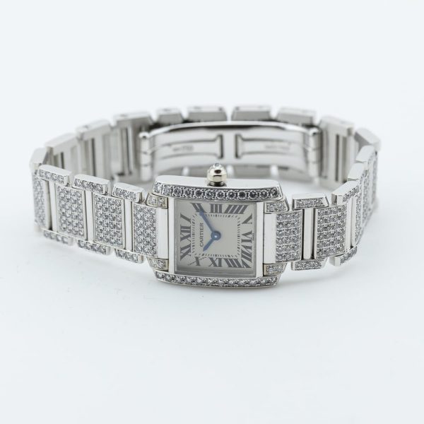 Cartier Tank Francaise 2365 White Gold Factory Diamonds Watch with Cartier service 2024, fully loaded set with approx. 6 carats of top colour and clarity round brilliant cut diamonds. Presented in its Cartier box along with a Cartier service warranty certificate from 2024 2 year warranty from Cartier