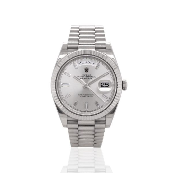 Rolex Oyster Perpetual Day Date Diamond 18ct White Gold Automatic Watch, fluted bezel surrounding silver sunburst dial with baguette-cut diamond-set baton hour markers, automatic calibre 3255 movement on white gold president strap