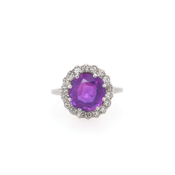Sapphire and diamond cluster ring in platinum.
