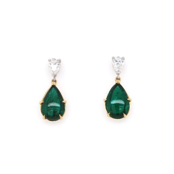 Emerald and diamond drop earrings in yellow gold.