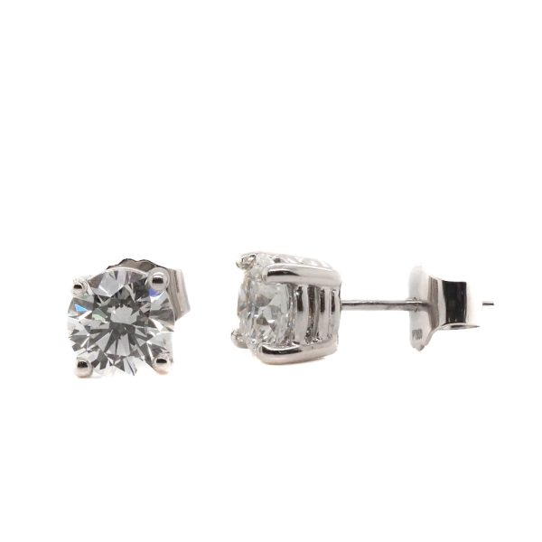Diamond stud earrings in platinum.
