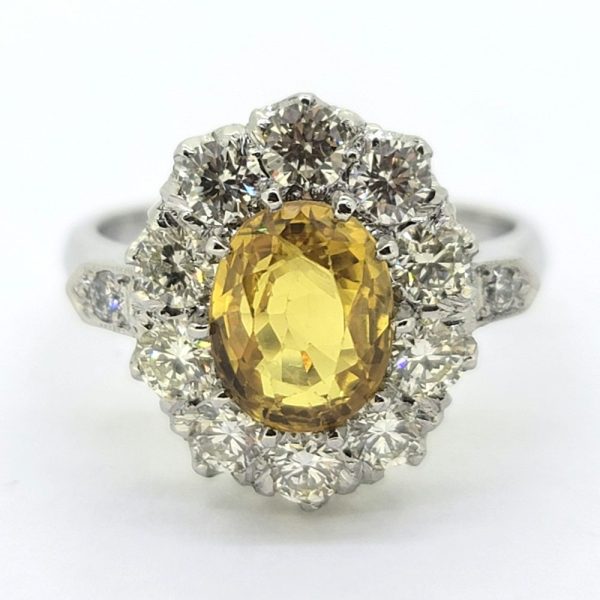 2.51ct Oval Yellow Sapphire and Diamond Cluster Engagement Ring in Platinum