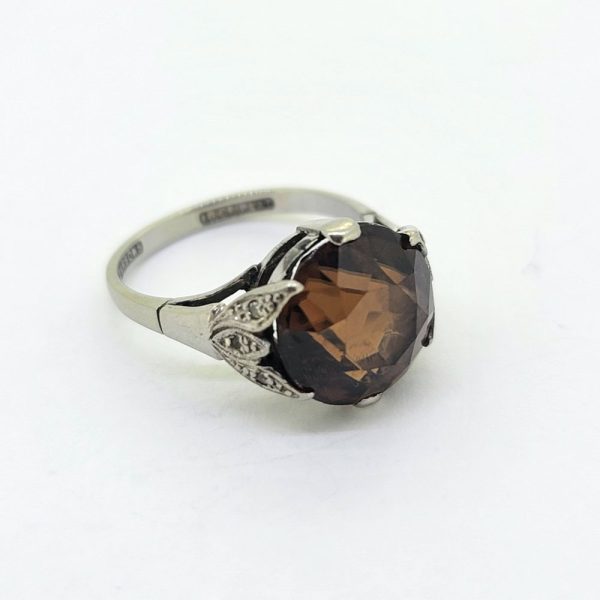 Vintage Brown Zircon Solitaire Engagement Ring, single stone brown zircon claw set in 18ct gold and platinum with diamond-set leaf-shaped shoulders