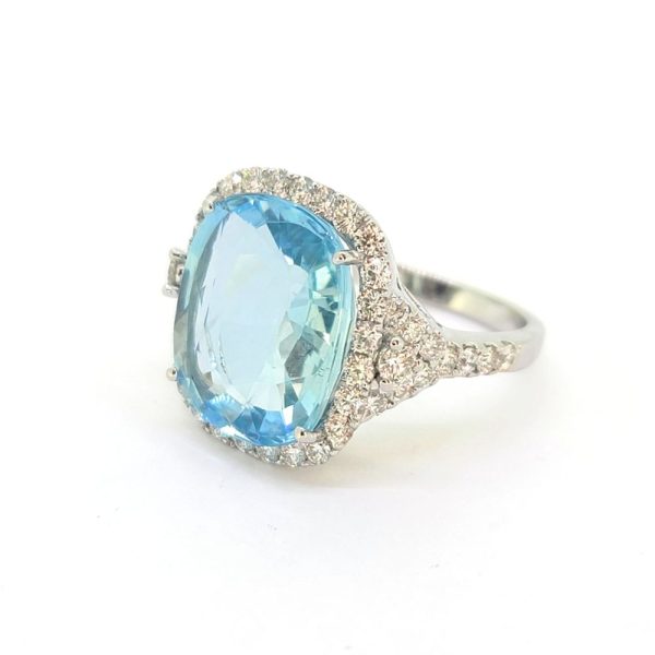 8ct Cushion Cut Aquamarine and Diamond Cluster Cocktail Dress Ring, large 8.08ct cushion-shaped aquamarine within halo of diamonds in 18ct white gold with tapered triangular diamond-set shoulders