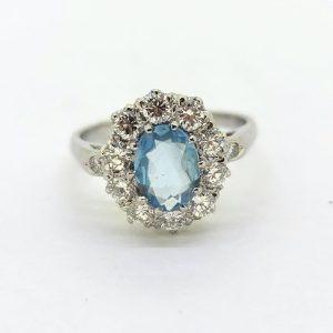 0.80ct Oval Aquamarine and Diamond Crown Cluster Engagement Ring