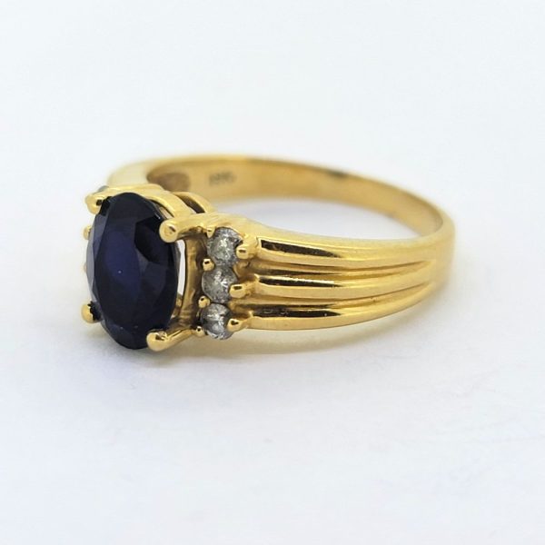 Oval Sapphire and Diamond Ring in 18ct Yellow Gold