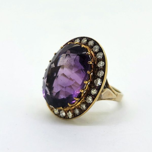 Oval Amethyst and Diamond Cluster Ring in Yellow Gold