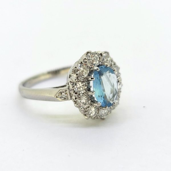 0.80ct Oval Aquamarine and Diamond Crown Cluster Engagement Ring