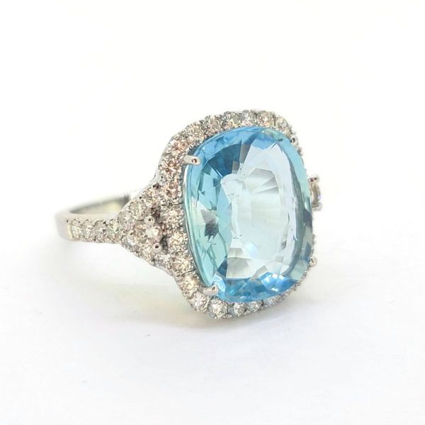 8ct Cushion Cut Aquamarine and Diamond Cluster Cocktail Dress Ring, large 8.08ct cushion-shaped aquamarine within halo of diamonds in 18ct white gold with tapered triangular diamond-set shoulders