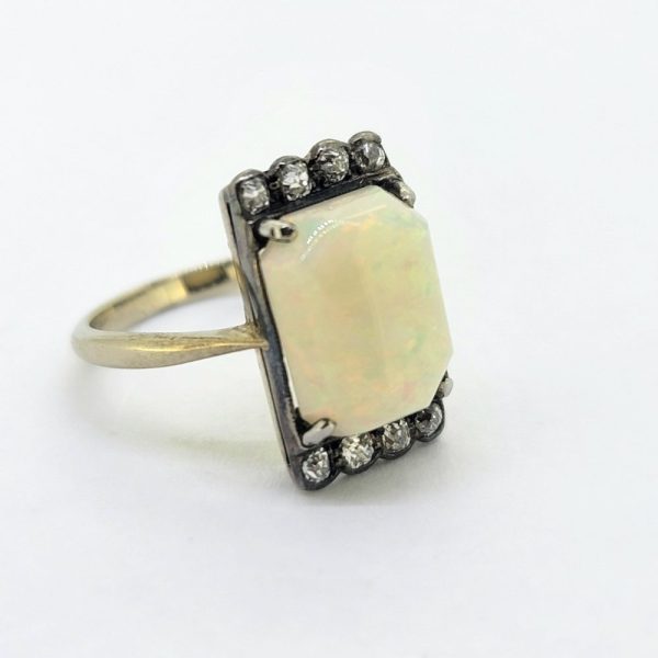 Art Deco Opal and Old Cut Diamond Plaque Tablet Ring, central cabochon opal edged with a top and bottom row of old-cut diamonds