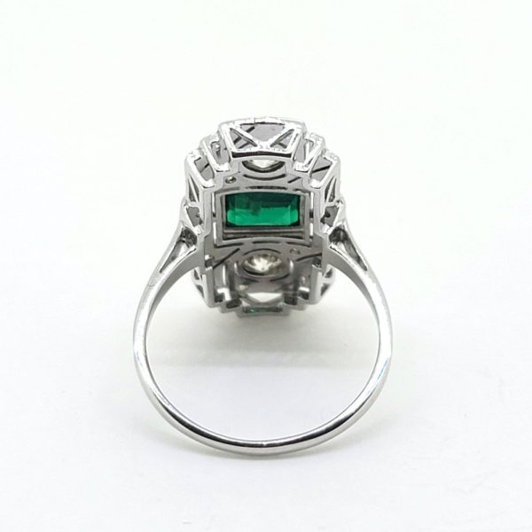 Art Deco Colombian Emerald and Diamond Tablet Plaque Ring, square step-cut Colombian emerald flanked top and bottom by sparkling diamond all within tablet surround accented with smaller diamonds in 18ct white gold
